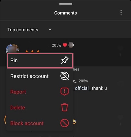 Long press on the comment and then choose Pin